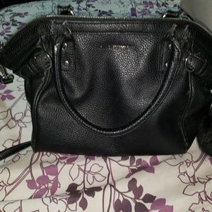 Used in great condition Buchman black purse